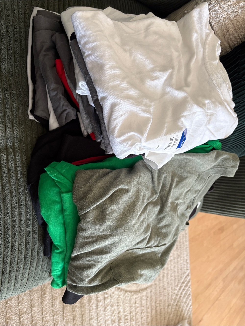 30 shirts total. Mostly Gildan Men's and Women's Shirts. Miscellaneous colours.